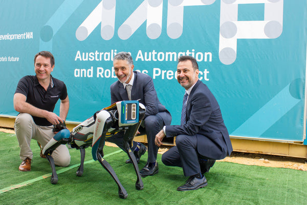 Spot standing with our Chironix Director, Minister for Lands and CEO of Development WA